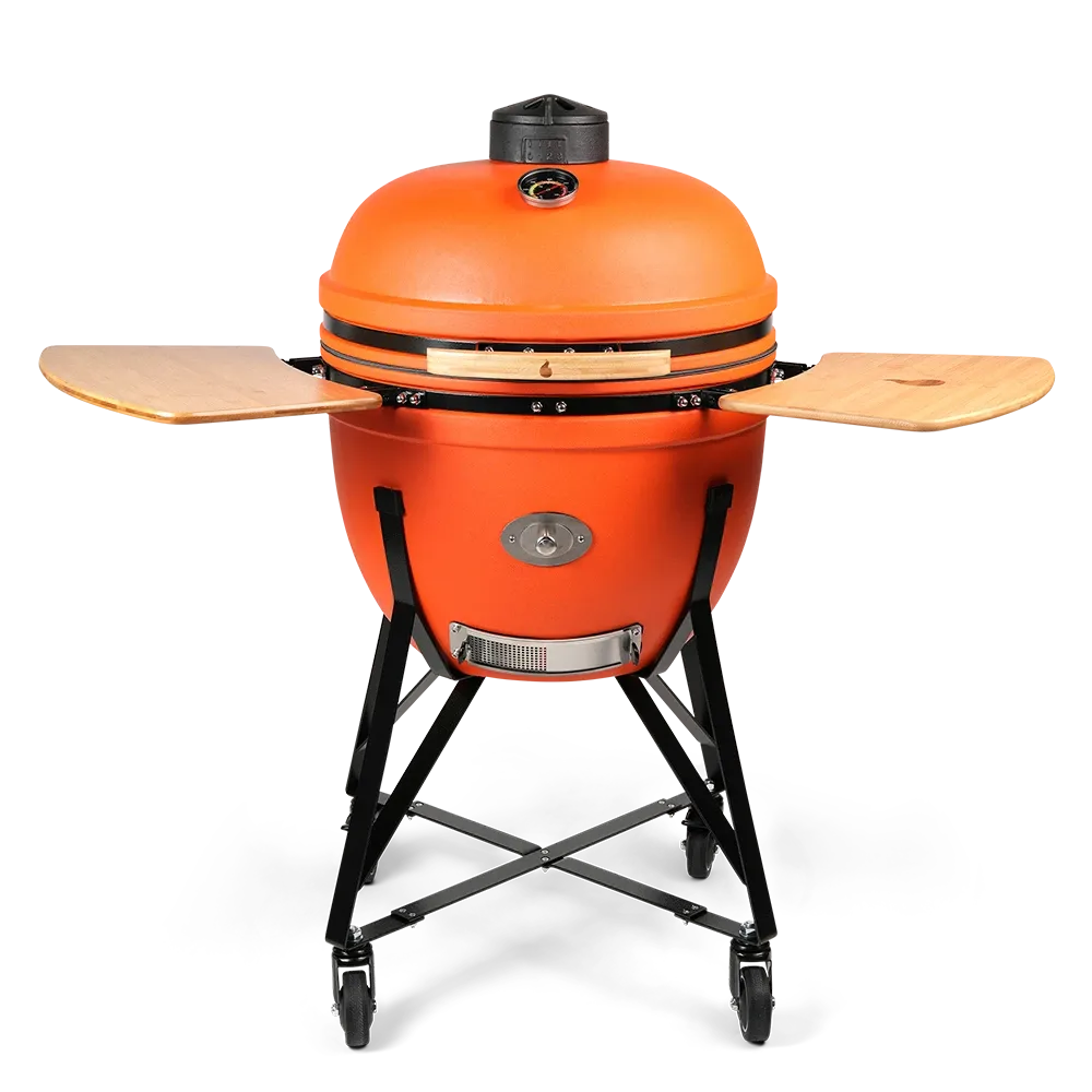 Desert-orange kamado on its wheeled cart with side tables open